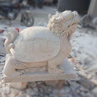 晚霞紅風(fēng)水龍龜石雕是怎么制作出來的？