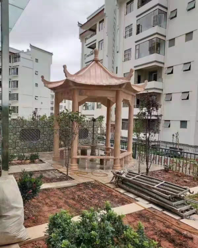 小區(qū)園林石涼亭，晚霞紅大理石石雕亭子