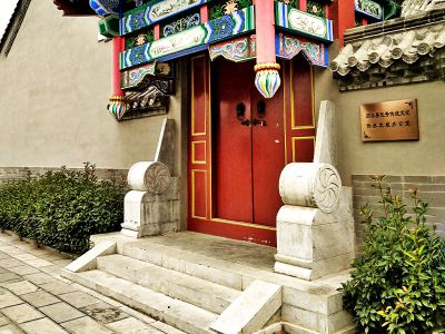 事業(yè)單位古建筑門(mén)口擺放漢白玉簡(jiǎn)約石抱鼓雕塑