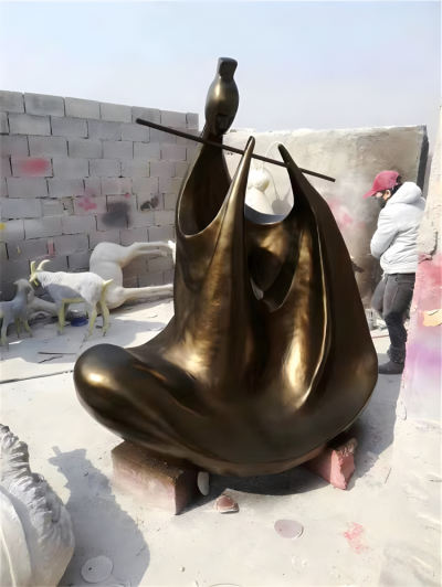 玻璃鋼仿銅吹笛子的抽象古代人物雕塑