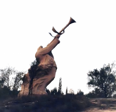 戶外石雕大型吹嗩吶的景觀人物雕塑