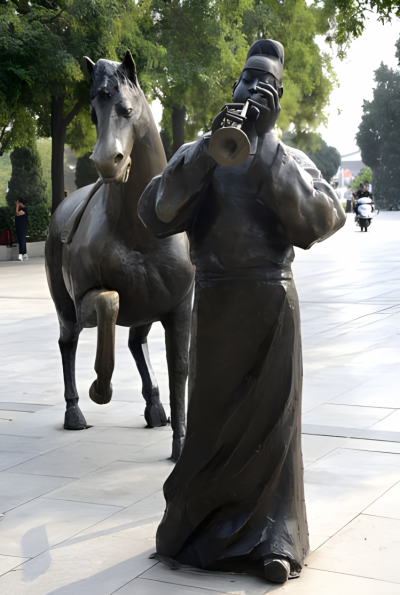 吹嗩吶的古代人物和馬銅雕